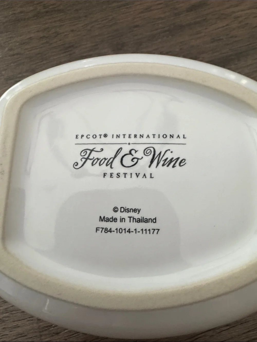 Disney/EPCOT White Ceramic Spoon Rest with Food and Wine Festival Artwork